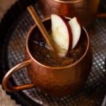 spiced apple cider moscow mule in copper mug