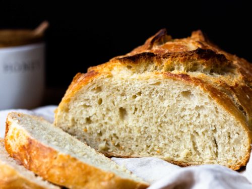 https://www.modernfarmhouseeats.com/wp-content/uploads/2021/02/Crusty-no-knead-bread-11-500x375.jpg