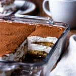 Espresso and coffee liqueur dipped ladyfingers get layered with creamy, fluffy, lightly sweetened mascarpone whipped cream and dusted with rich cocoa powder. This easy, fresh, super delicious no-bake Italian dessert has all the best Tiramisu flavors but without raw eggs.