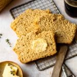 The most buttery, soft, and flavorful bread that is made with only 6 simple ingredients that you likely already have in your home, including a bottle of beer and a whole stick of butter. All you need is 10 minutes to prepare the bread, then bake till the top is golden brown. No rising or yeast needed!