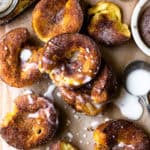 Cinnamon Sugar Churro Popovers are super easy to make and popping with flavor! All you need is 10 minutes to mix up the batter, then bake in a muffin tin until golden, puffed perfection. Brush the warm popovers with butter, sprinkle with cinnamon sugar and serve with homemade vanilla icing. So amazing!!