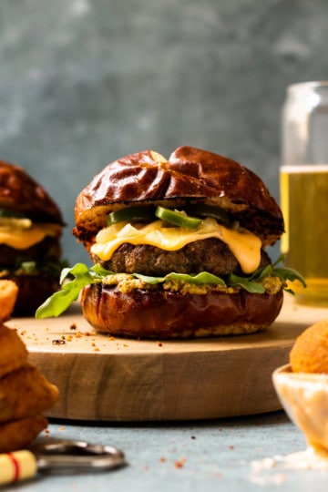 Beer Cheese Burgers on Pretzel Buns with Caramelized Beer Onions and ...