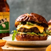 beer cheese burger on pretzel bun