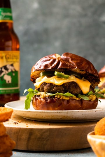 Beer Cheese Burgers on Pretzel Buns with Caramelized Beer Onions and ...