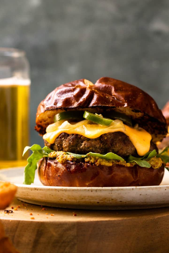 Beer Cheese Burgers on Pretzel Buns with Caramelized Beer Onions and ...