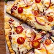 grilled pizza drizzled with hot honey butter