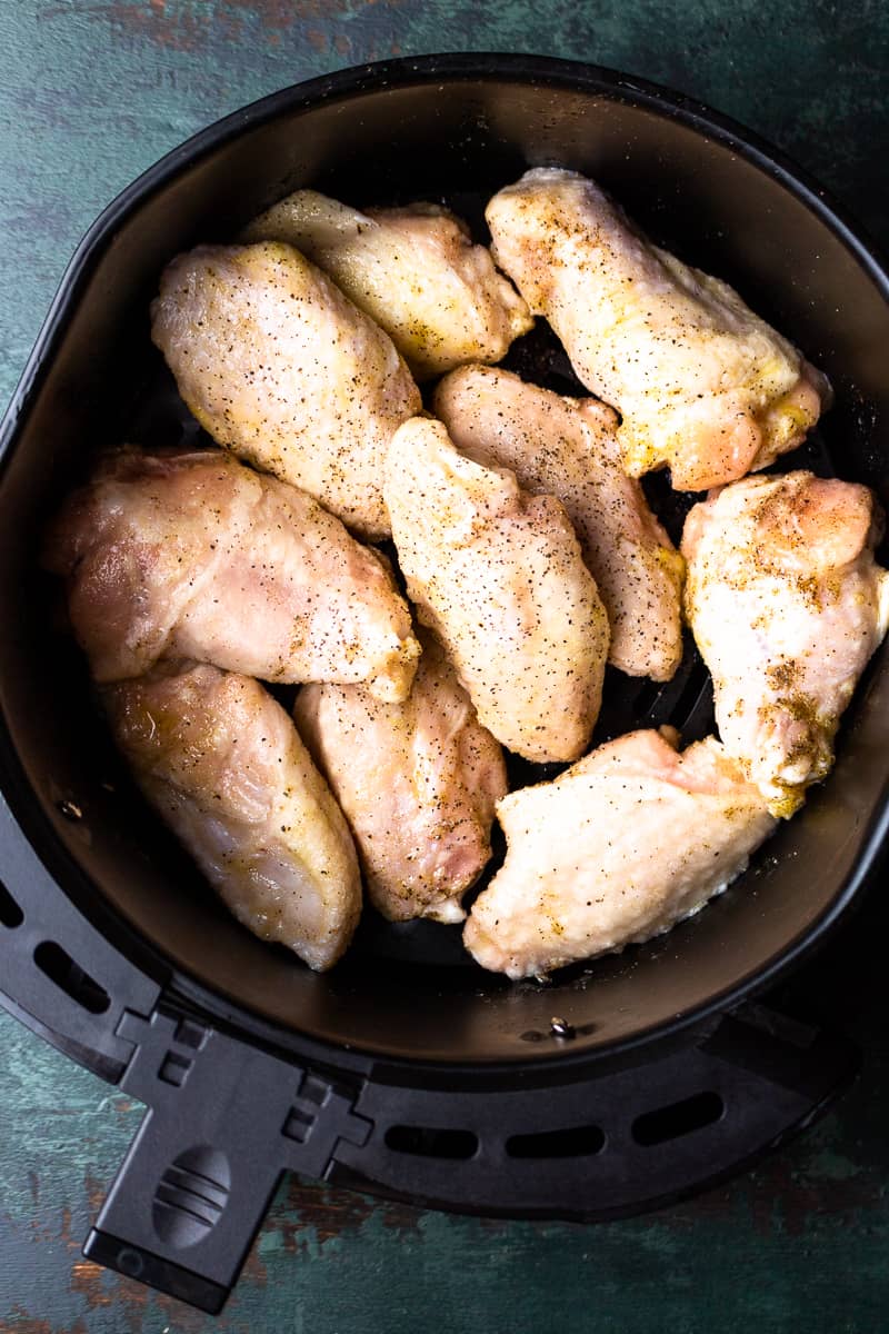 https://www.modernfarmhouseeats.com/wp-content/uploads/2022/02/air-fryer-frozen-chicken-wings-hot-honey-butter-1.jpg