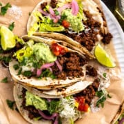 three ground venison tacos on a plate