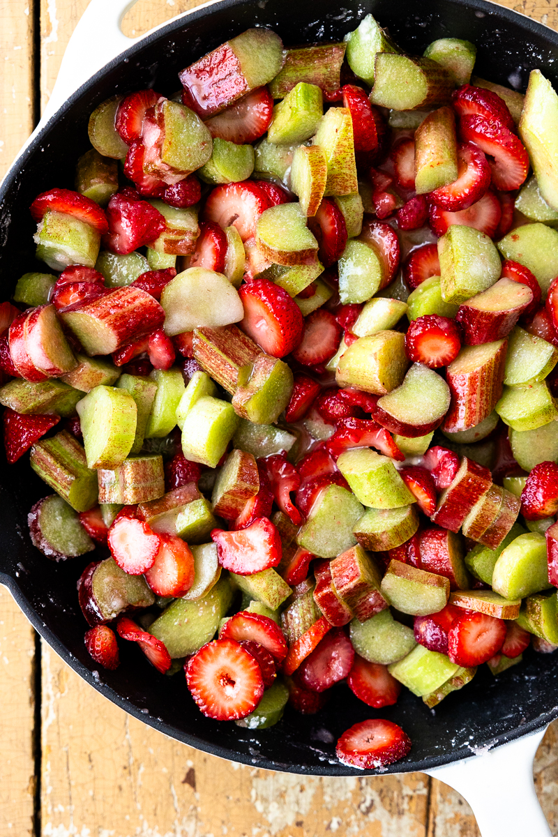 chopped strawberries and rhubarb in a skillet