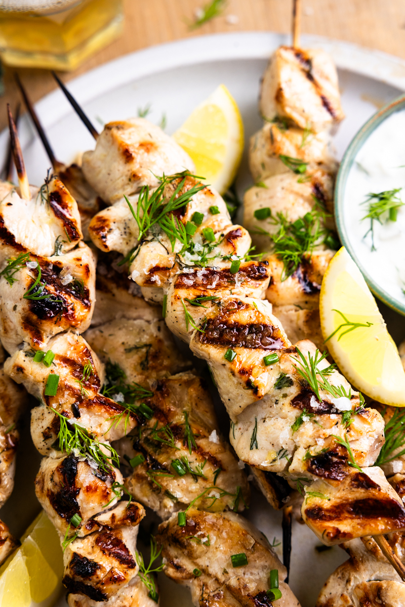 close up of grilled chicken skewers