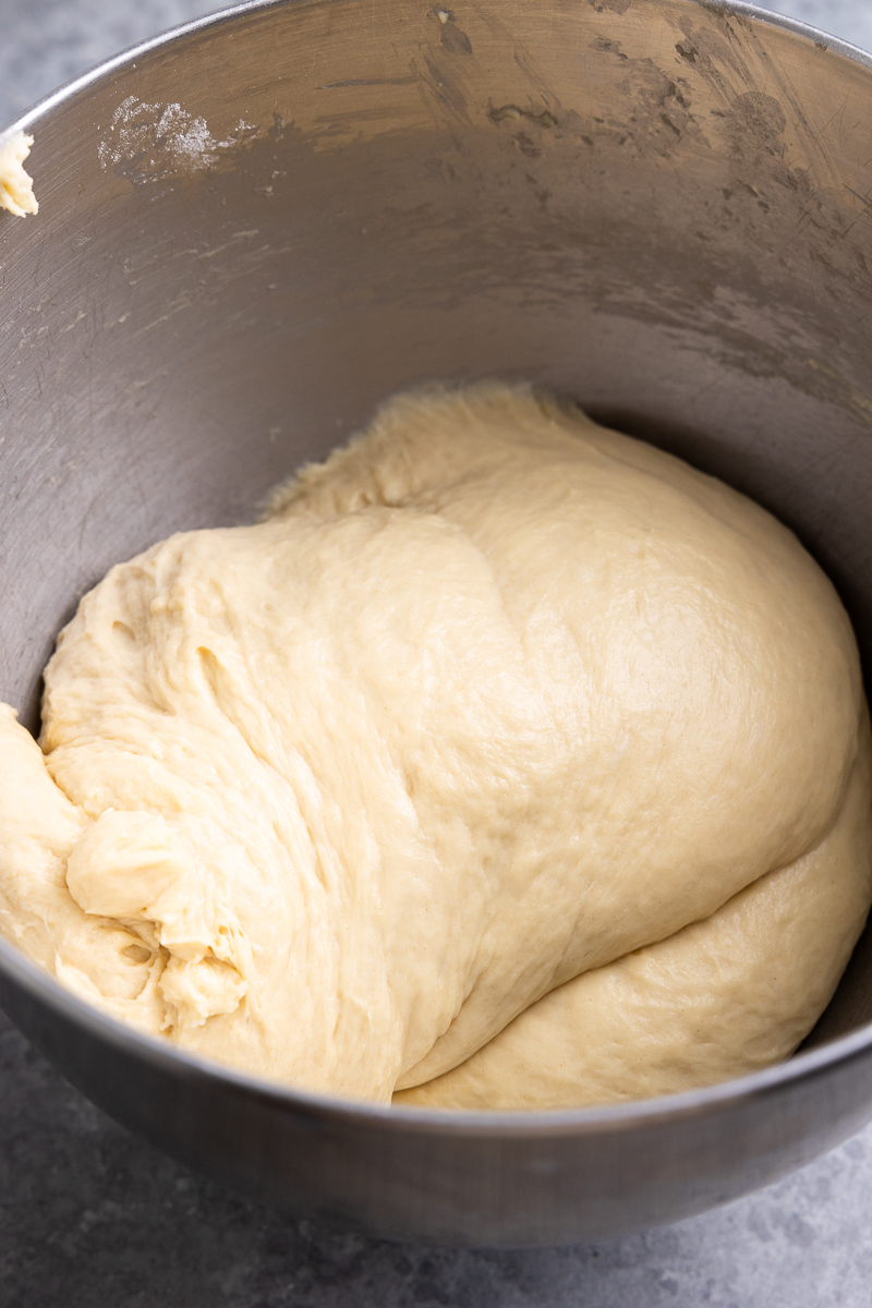 dough in a bowl after it's been kneaded