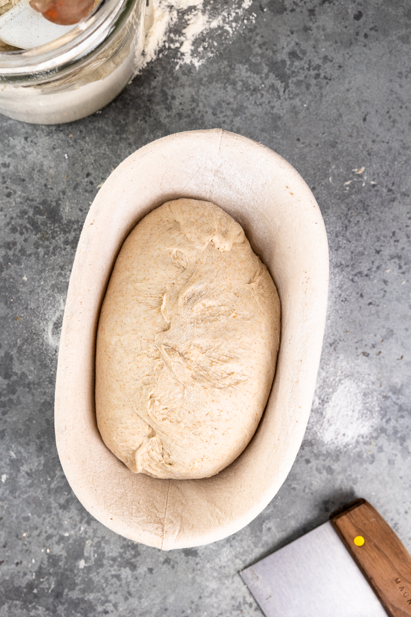 the dough is placed in a proofing basket with the seam side up