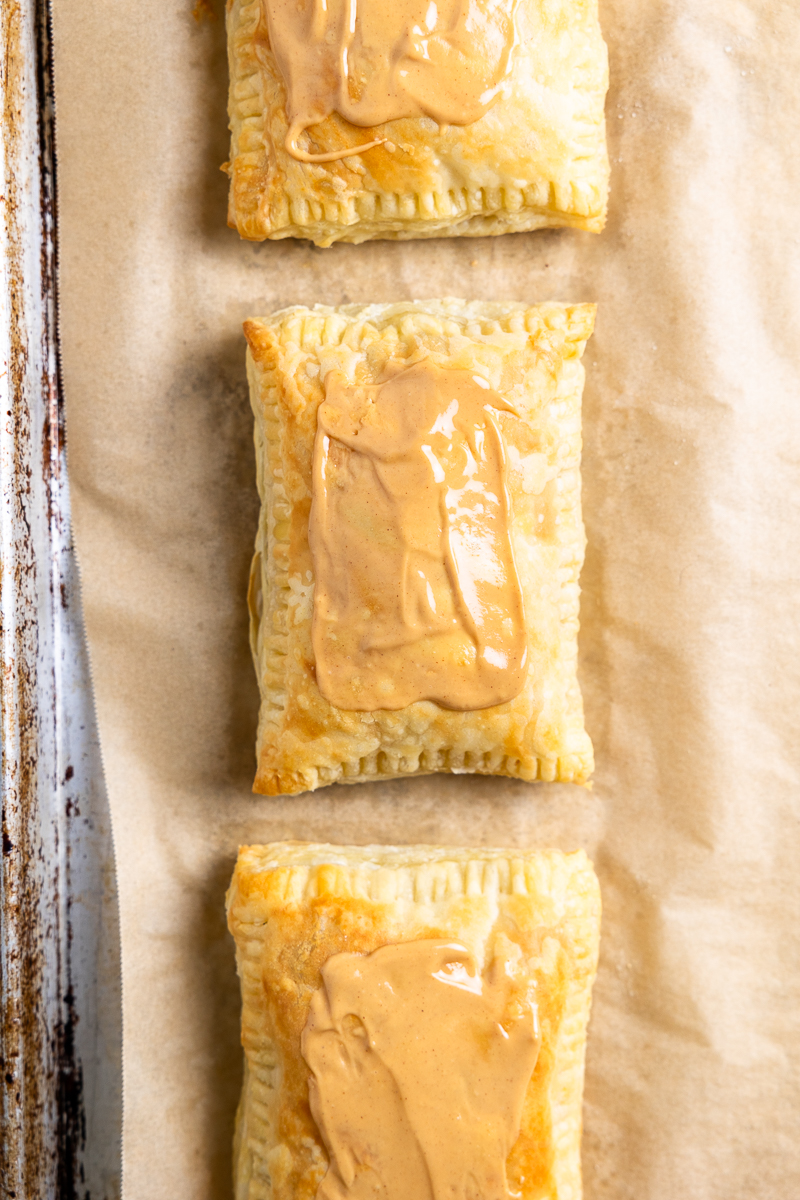 Baked pastries topped with peanut butter