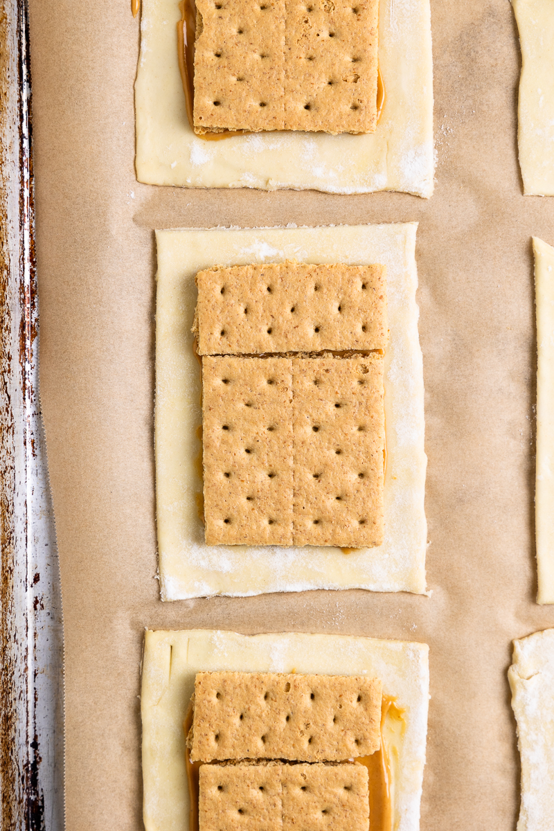 pastry spread with peanut butter then topped with graham crackers